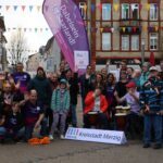 Gruppenfoto aller Beteiligten der Aktion zum Welt-Down-Syndrom-Tag in Merzig